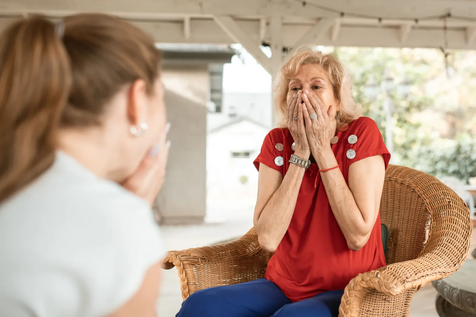 Older woman discussing support options with a professional